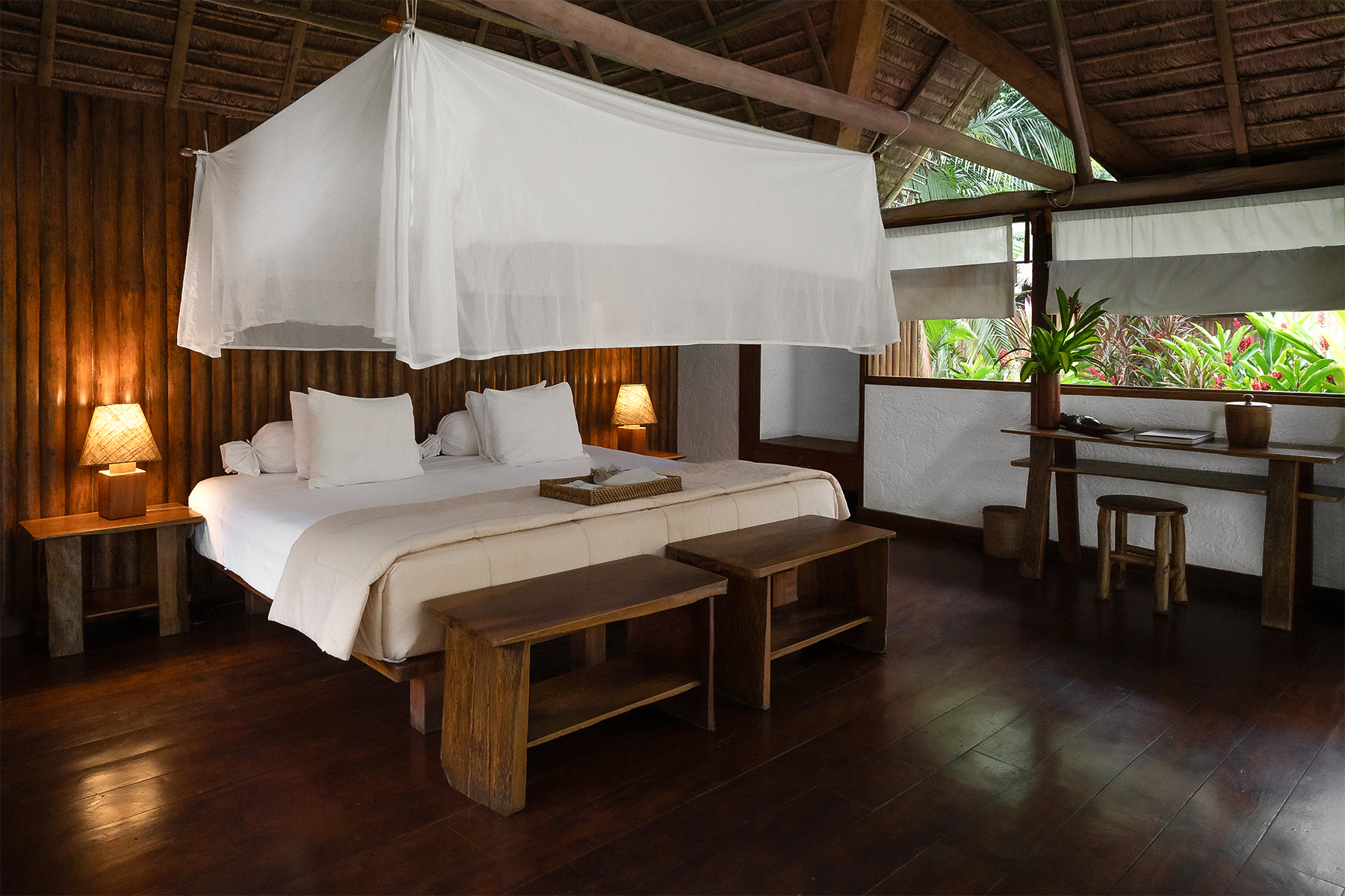 Inkaterra Reserva Amazónica Cabana with canoppy bed